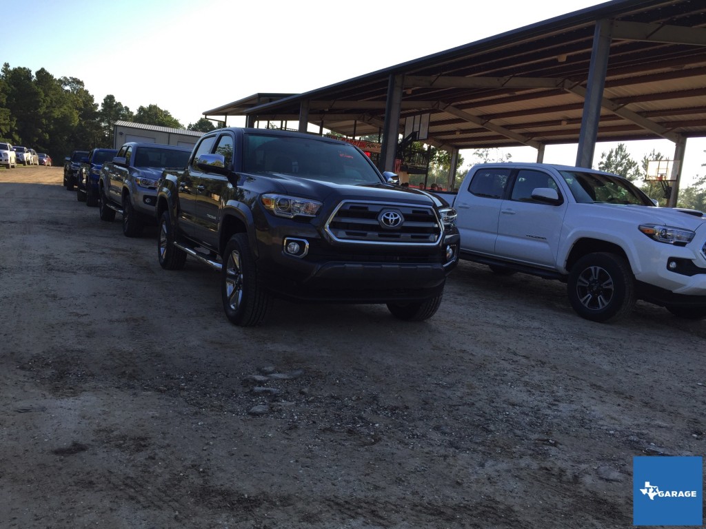Trucks staged and ready to go at Rio Bravo Motocross Park.